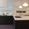 Szkło w kuchni w formie lacobel jako innowacyjny kierunek na udekorowanie pomieszczenia.